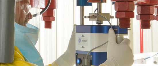 A technician operates the remote uncoupling tool at GE Hitachi’s under vessel training facility in Wilmington, NC.